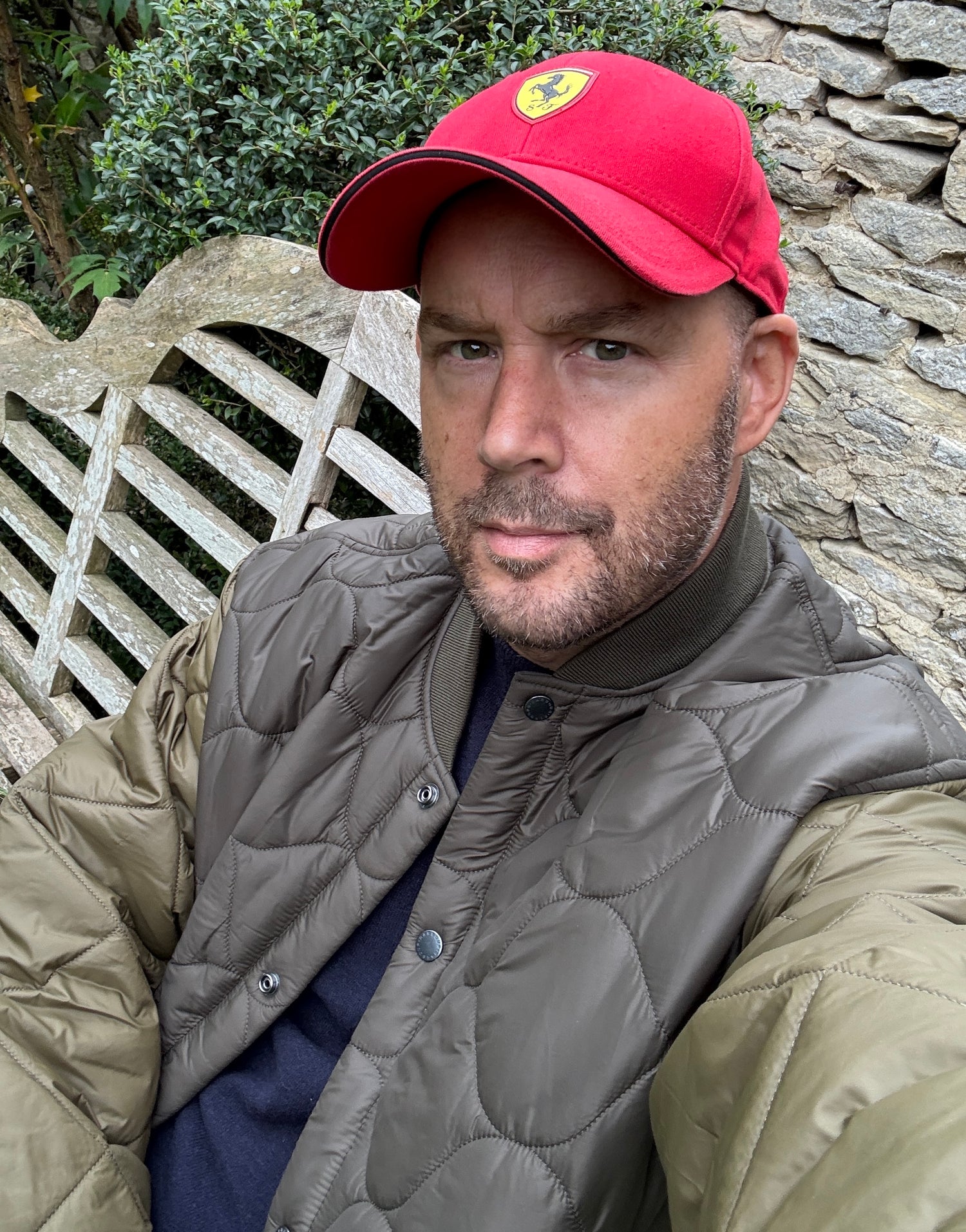 Teddy McDonald artist designer art advisor Ferrari hat Barbour jacket Cotswolds garden 