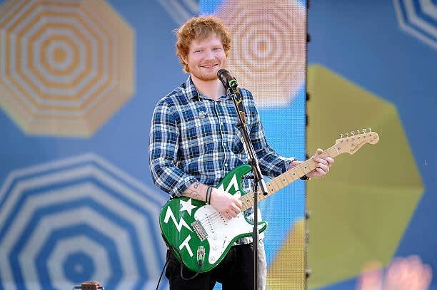 ed sheeran performing thinking out loud playing a fender Stratocaster known as Green T and designed by artist Teddy McDonald 2015
